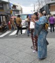 Girls in kimonos in the middle of the street